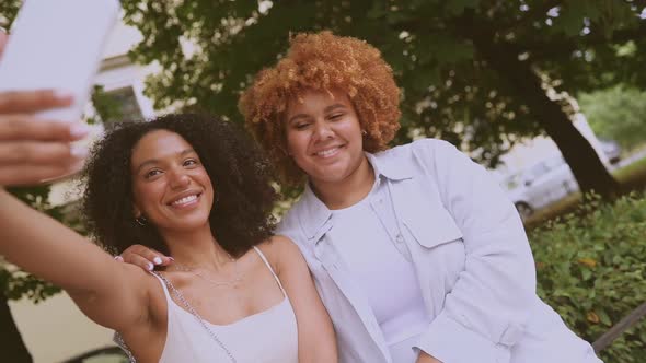 Lovely Beautiful Happy Lesbian African American Couple Hugging Making Selfie Around City Street