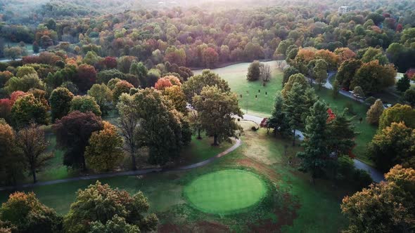 4k Aerial View of Drone Flying above the stunning colorful treetops in Louisville on Autumn Morning