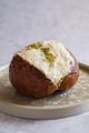 Pistachio Maritozz, an italian roman breakfast sweet, whipped cream sandwiched between brioche - PhotoDune Item for Sale