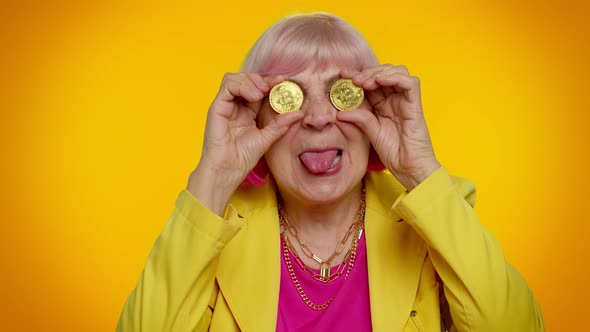 Mature Old Granny Stylish Woman Showing Golden Bitcoins Cryptocurrency Investment Mining Technology