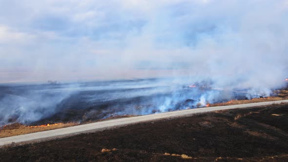 Aerial View of a Burning Dry Field