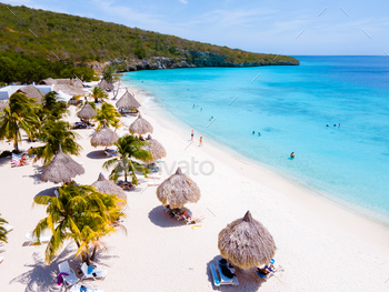 land of Curacao, Playa Cas Abao with beach chairs and umbrellas in Curacao