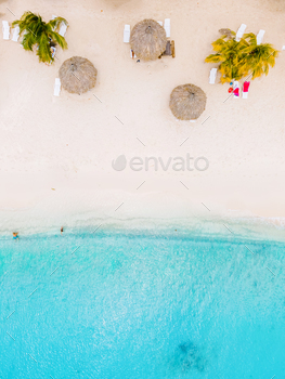 Curacao, Playa Cas Abao in Curacao Caribbean tropical white beach with a blue turqouse colored ocean. Drone aerial view at the beach