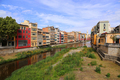 Colorful houses and Eiffel bridge and river Onyar in Girona - PhotoDune Item for Sale