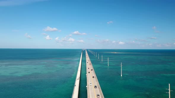 Vehicles Driving On Seven Mile Bridge Across Florida Keys In Monroe County, Florida. aerial