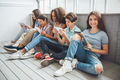 Teenagers with gadgets - PhotoDune Item for Sale