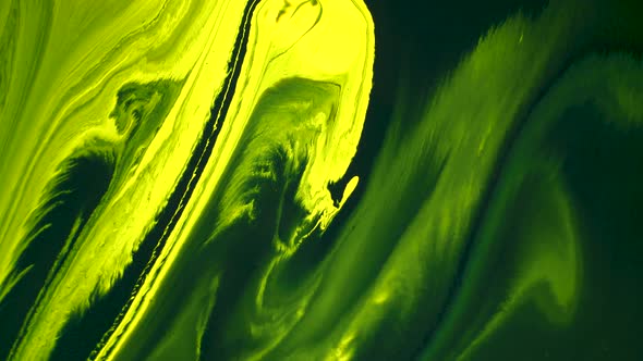 Green and Yellow liquid paint droping in Organic Shape