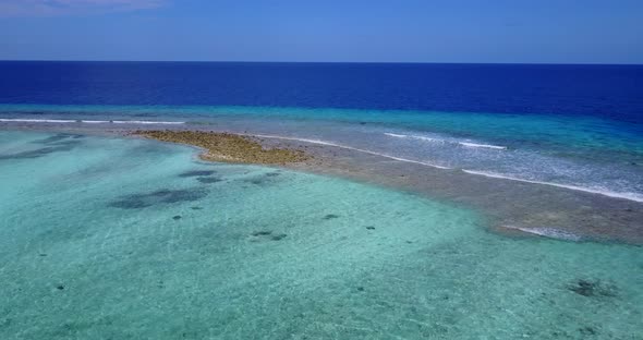 Beautiful aerial abstract view of a paradise sunny white sand beach and aqua blue water background i