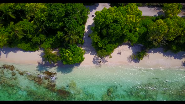 Aerial drone shot travel of paradise island beach break by blue ocean and white sand background of a