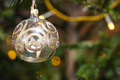 ball with golden pattern on christmas tree closeup - PhotoDune Item for Sale