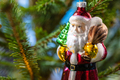 glass santa claus figurine on xmas tree close up - PhotoDune Item for Sale