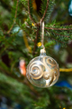 glass ball with golden ornament on christmas tree - PhotoDune Item for Sale