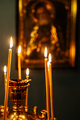 funeral candles burn on altar in front of icon - PhotoDune Item for Sale