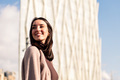 smiling young woman taking a walk enjoying city - PhotoDune Item for Sale