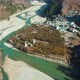 Aerial drone shot of  bridge over the Bhagirathi river flowing through sands in Harshil Village - VideoHive Item for Sale