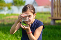 Child in nature with a lizard. Selective focus. - PhotoDune Item for Sale
