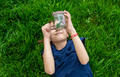 Child in nature with a lizard. Selective focus. - PhotoDune Item for Sale