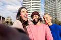 selfie of three friends having fun in the city - PhotoDune Item for Sale
