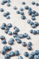Fresh blueberries scattered on a linen napkin. - PhotoDune Item for Sale