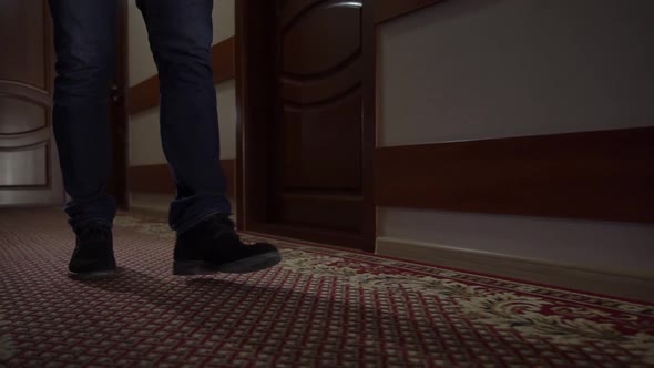 Man Walks In The Corridor