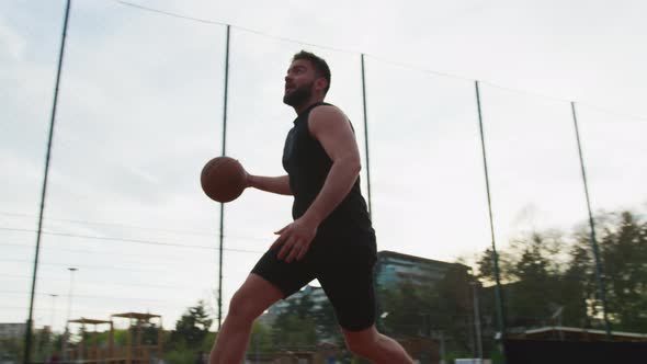 Man throwing the basketball and missing the shot