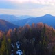 Aerial shot. Flying over the top of the hill. Forest hilly landscape in the Carpathians - VideoHive Item for Sale