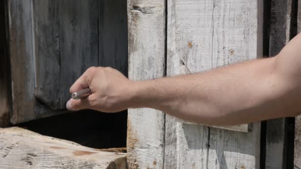 Water well wheel handle pushing slow-mo footage