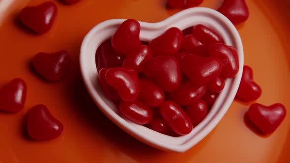 Rotating stock footage shot of Valentines decorations and candies - VALENTINES 0079