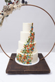 Beautiful four tiered wedding cake decorated with colorful icing flowers - PhotoDune Item for Sale