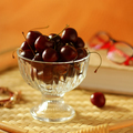 Cherry. a light snack with cherry berries and reading a book. a vase of berries on a tray in bed. - PhotoDune Item for Sale