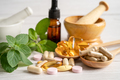 Alternative medicine herbal organic capsule drug with herbs. - PhotoDune Item for Sale