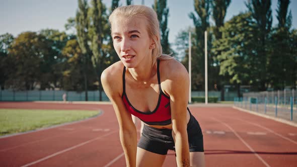 Close Up Portrait of a Tired Sportswoman Out of Breath