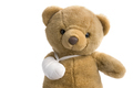 Toy teddy bear with a broken leg close up - PhotoDune Item for Sale