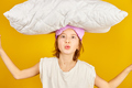 Funny teenage girl in white pyjamas with a violet sleeping mask hold pillow - PhotoDune Item for Sale