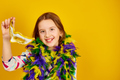 A joyful teenager girl wearing a colorful Brazil carnival mask - PhotoDune Item for Sale