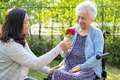 Caregiver daughter hug and help Asian elderly  - PhotoDune Item for Sale