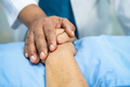 Holding hands Asian elderly woman patient with love, care, encourage and empathy at hospital. - PhotoDune Item for Sale