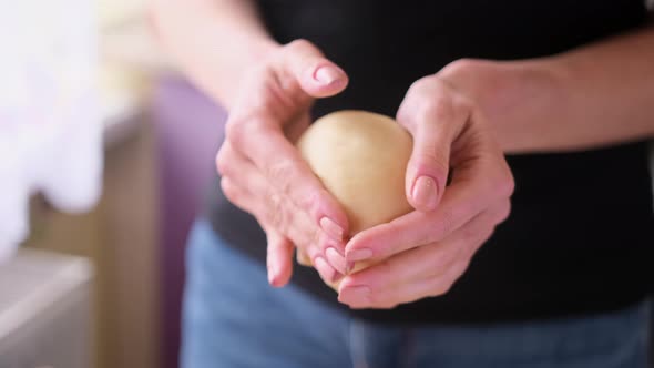 Apple Pie Preparation Series  Women's Hands Kneading Dough