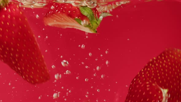 Cooking Strawberry Sweet Cocktail Cold Lemonade with Red Berries Carbonated Water with Floating