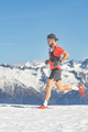 Trail running athlete runs in the snow - PhotoDune Item for Sale