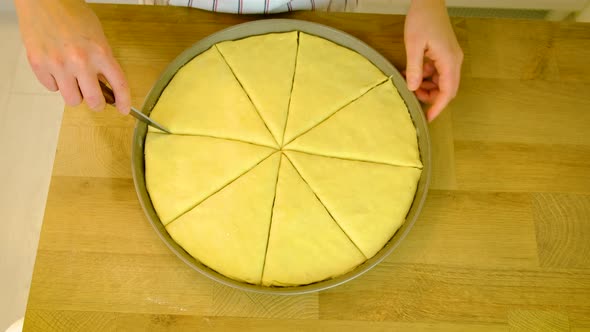 A Woman is Preparing Baklava in the Kitchen