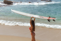 Surfer Woman with Surfboard in Tropical Paradise During Summer Sea Vacations - PhotoDune Item for Sale