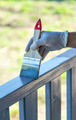 Painting a wooden board with a gray brush. Selective focus. - PhotoDune Item for Sale