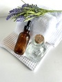 Essential oils on white towels with lavender  - PhotoDune Item for Sale