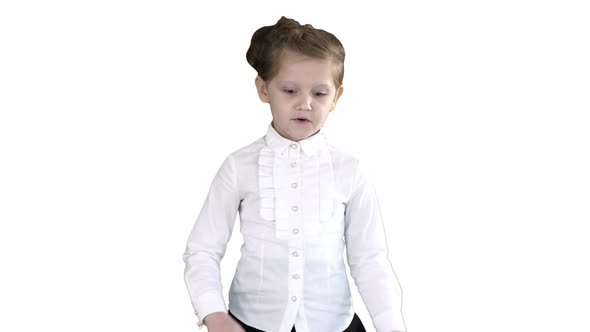 School Girl Walking and Talking To Camera on White Background.