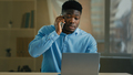African male businessman ethnic 30s man office worker work distant from home talk business - PhotoDune Item for Sale