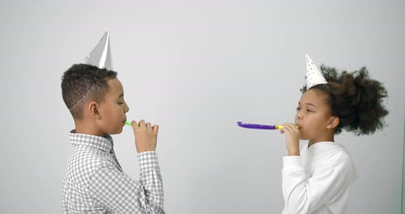 Black Kids Celebrating Birthday Over White Background