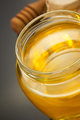 glass jar of honey on black - PhotoDune Item for Sale