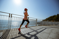 Healthy lifestyle fitness sports woman runner running up stairs on seaside trail - PhotoDune Item for Sale