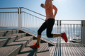 Healthy lifestyle fitness sports woman runner running on seaside trail - PhotoDune Item for Sale